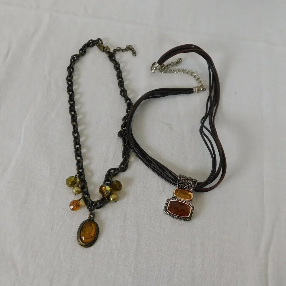 Cookie Lee Lot of 2 Necklaces Amber Orange Colors Cameo Brown Bronze Cord Chain - Picture 1 of 10